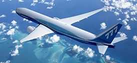 777 in Boeing livery in flight